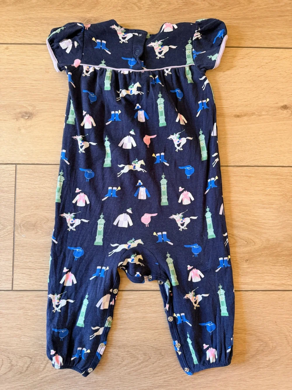 The Beaufort Bonnet Company Navy Short-Sleeve One-Piece with Pastel Jockey Print
